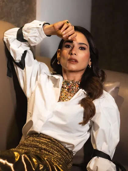 A powerful and chic portrait of Aneri Vajani, her confident gaze matched by the boldness of her statement necklace.