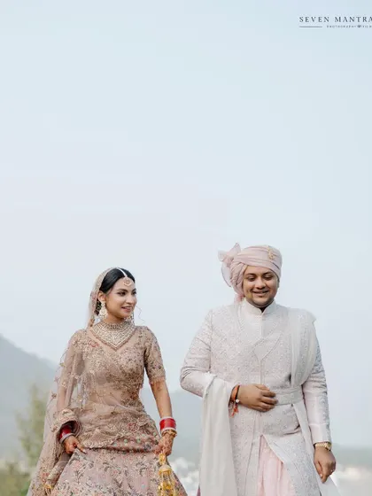 A quiet moment together. This photo captures the couple's calm and happy connection before the main ceremony.