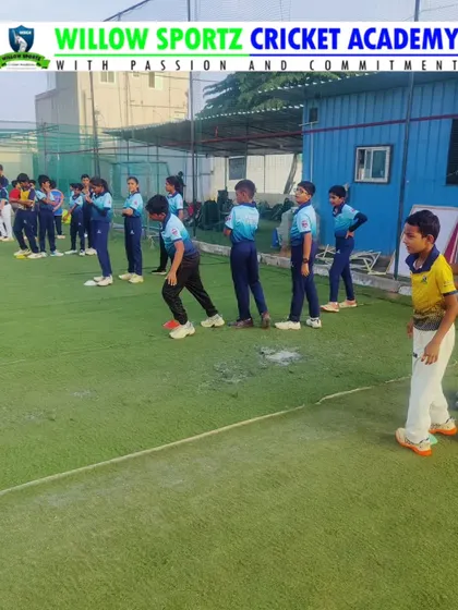 A snapshot of a fielding drill session. Focus, discipline, and dedication are visible as our players prepare to take catches.