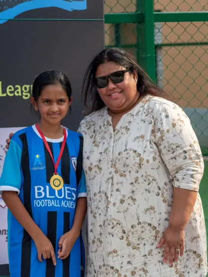 Another one of our rising stars receives a medal for her Man of the Match performance, a reward for her hard work and game spirit.