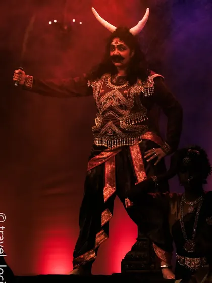 The intensity of the demon character, captured through makeup, costume, and expression.