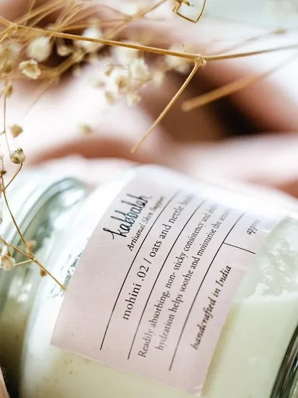 A close-up on the label of my 'Mohini' body yogurt. I always list the key ingredients, like oats and nettle, so you know exactly what you are putting on your skin.
