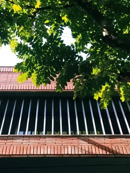A close-up of the exposed brick facade on an office building I designed. The choice of material and the careful bricklaying pattern give the building a timeless and sturdy character.