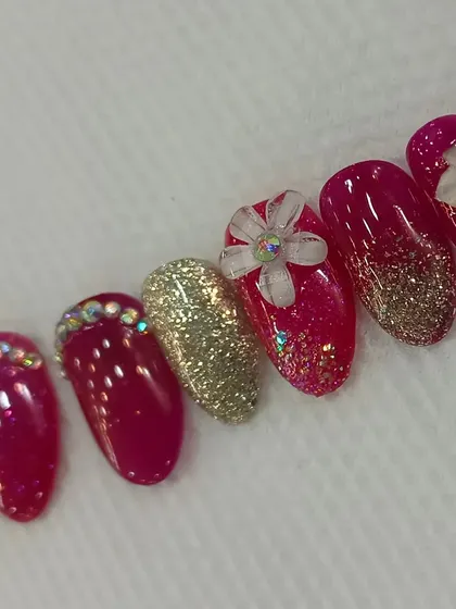A closer look at the 3D floral details and rhinestone placement on the press-on nails. I teach the techniques for securely applying these embellishments.