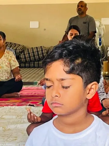 A young boy finds stillness and focus.