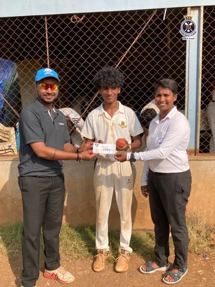 Shamik Shettigar receiving an award after his exceptional bowling performance, taking 6 wickets for his school team in the Harris Shield Tournament.