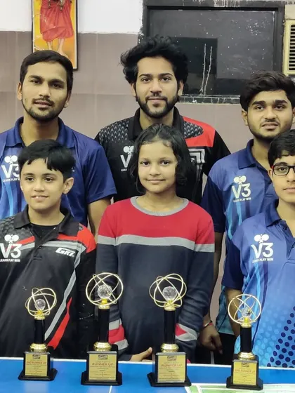The team after a successful run at the Gautam Budh Nagar Table Tennis Championship. I'm pictured here with some of our medalists and their well-deserved trophies.