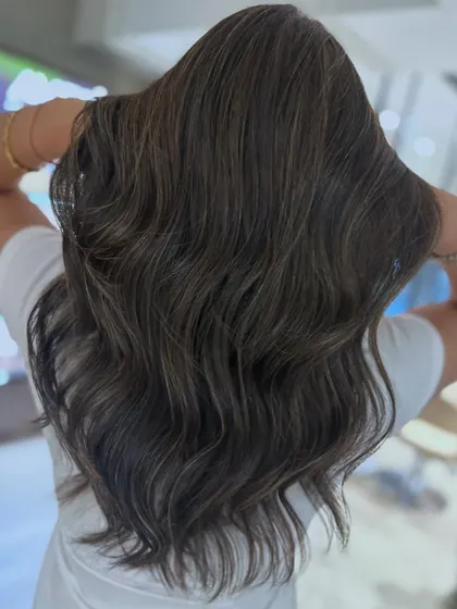 Cool-tone babylights are perfect for a subtle, blended look. This technique adds a touch of brightness and dimension without a drastic change.
