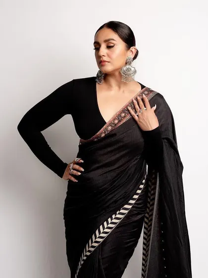 A different angle of the JJ Valaya saree, showing off the sleek bun and the stunning oversized silver earrings that completed this modern ethnic look.