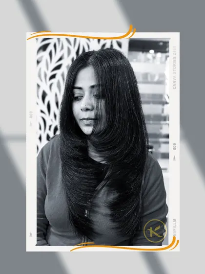 A beautiful example of a long layered haircut, also known as a feather cut. This style removes weight while maintaining length, resulting in bouncy, well-defined layers.
