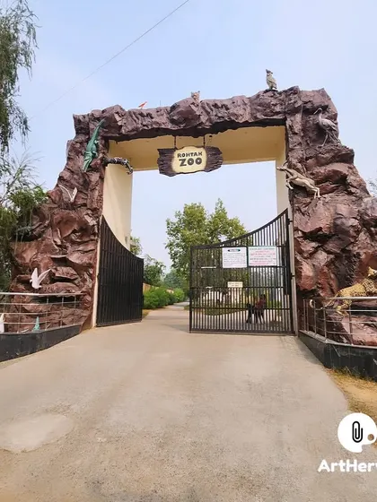 The completed Rohtak Zoo entrance, a large-scale architectural sculpture that welcomes visitors with a display of sculpted wildlife.