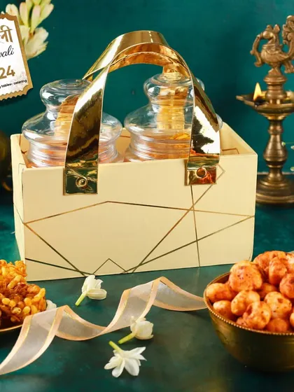 A beautifully styled shot of our two-jar caddy hamper, perfect for gifting savory snacks like roasted makhana during Diwali.