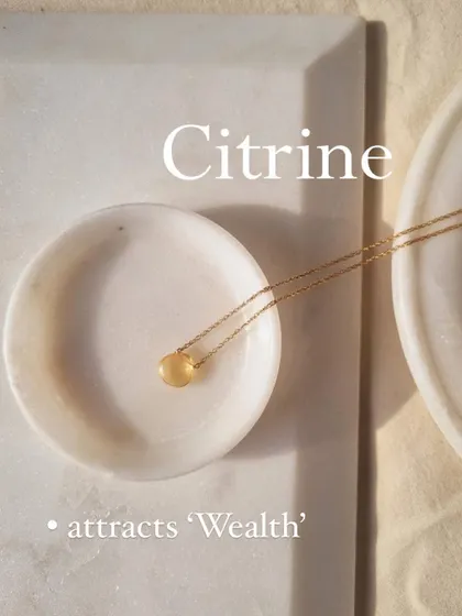 This is my 'Badamcha' Citrine heart-shaped drop pendant. Citrine is a powerful stone that attracts wealth and abundance.