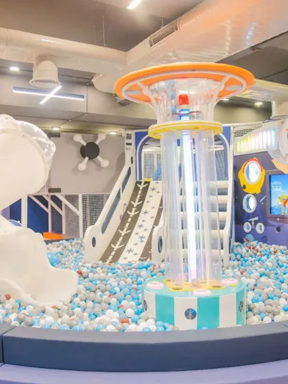 A glimpse of our main play area, featuring the huge ball pit, slides, and a central tower. It's a safe, clean, and vibrant space designed for hours of climbing, sliding, and adventure.