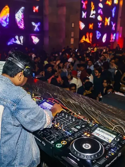A view from behind me at the decks, showing the packed club. I love this perspective, being at the center of the energy.