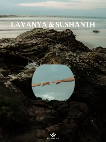 An artistic shot using a mirror to reflect the couple's hands reaching for each other on the beach. This creative technique adds a layer of depth and symbolism to their love story.