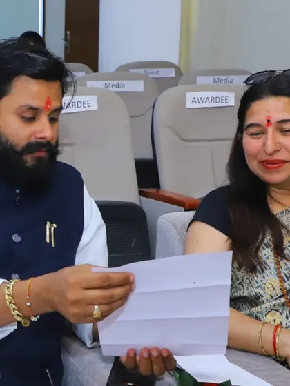 Discussing the program details at the Yog Ratn Award event. Every event is an opportunity to connect with fellow practitioners and share our passion for yoga.