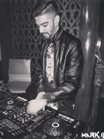 A shot showing the motion of my hands on the decks. DJing is a hands-on craft that requires quick thinking and a deep knowledge of music.