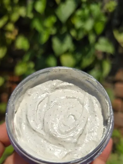 A close up of my 3 in 1 Instant Facial Scrub. This is a powerhouse product that cleanses, exfoliates, and brightens your skin all at once. It's perfect for removing dead cells, controlling acne, and tackling blackheads.