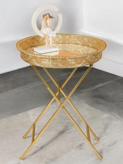 A round version of my gold tray-top side table. Its intricate patterned edge adds a touch of elegance, making it a beautiful and functional addition to your living space.