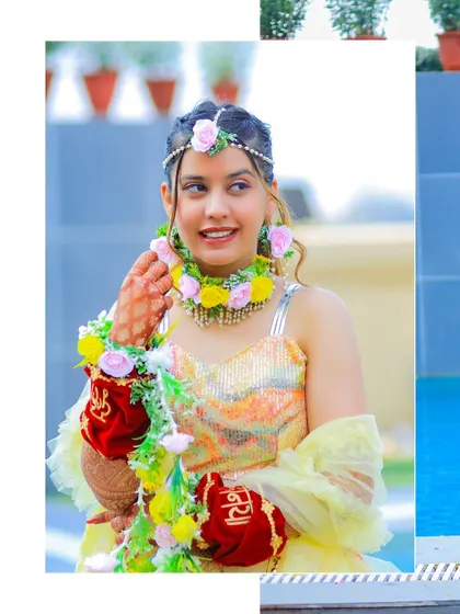 A close-up of the bride's happy expression and beautiful floral jewelry. We focus on capturing the details that make each bride's Haldi look special.
