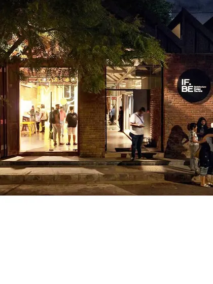 At night, the restored IF.BE space reveals its new life as a cultural hub. This project was an act of urban archaeology, transforming a derelict ice factory into a public space for art and discourse, proving that preservation is a powerful form of sustainable development.