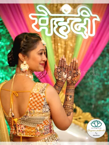This bride looks so beautiful showing off her custom Maharashtrian mehendi at her mehendi ceremony.