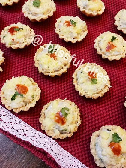 A close-up look at the rich and creamy filling of my chicken and cheese tarts, a popular choice for catering orders.