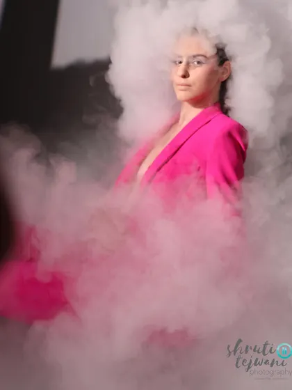 A creative shot where the smoke envelops the model's head like a cloud, adding an avant-garde touch to the Label.san campaign.