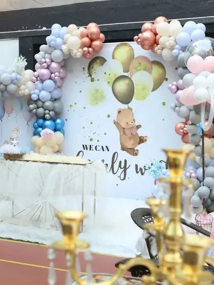 A stunning backdrop for a teddy bear theme, showing how I can customize the space for any creative idea. The balloon arrangements and cake table are set up for a perfect photo opportunity.