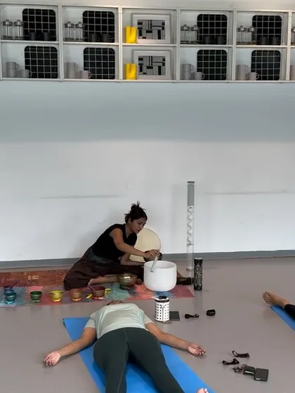 A sound bath brings a beautiful close to a physical practice. Here at IKEA, employees relax on their mats as I play the crystal and Tibetan bowls, creating a serene atmosphere for deep relaxation right in their workspace.