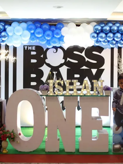 This Boss Baby setup is all about making a statement. We used a bold black and white striped backdrop, a giant 'ONE' prop, and a life-sized cutout of the birthday boy to match the theme.