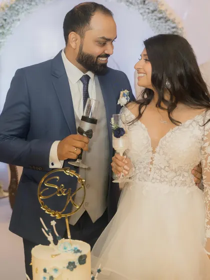 A celebratory moment for the couple as they toast to their new life together.