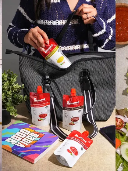 Product photography should tell a story. Here, I styled these convenient sauce pouches to show them in a real-life context, ready to be packed in a bag for a meal on the go. This lifestyle approach helps customers visualize using the product themselves.