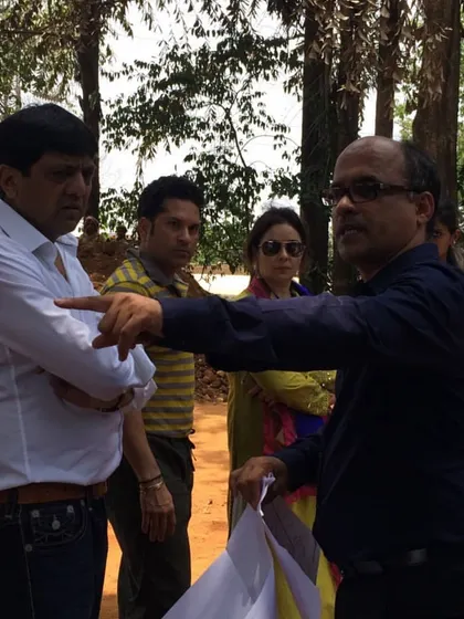 We believe in a deeply collaborative process with our clients. Here, we are on-site discussing the design for a bespoke private residence with our esteemed client, Sachin Tendulkar.