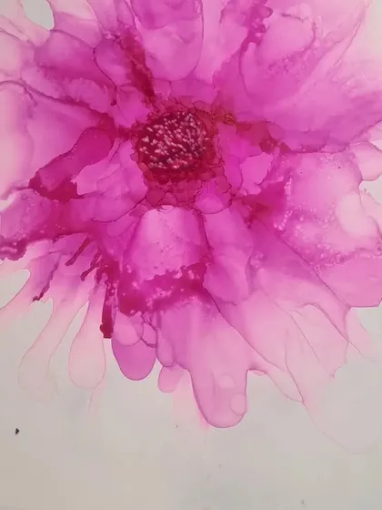 Learning to create delicate floral patterns with alcohol inks. This technique allows for beautiful, translucent petals and a soft, dreamy effect.