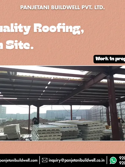 Quality roofing, delivered and installed on site. Here, you can see the PUF panels neatly stacked and the initial layers of the roof already being fitted onto the structure at the Gurgaon project.
