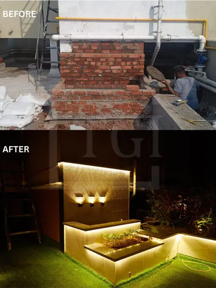 Even small, awkward spaces have potential. I converted this area with exposed brick and pipes into a stunning, illuminated water feature that becomes a focal point at night.