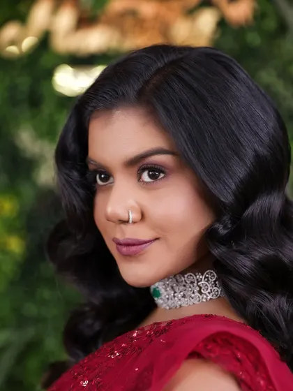 A close-up on the red carpet makeup, showing the clean, defined eye makeup and perfectly blended skin that students learn to master.
