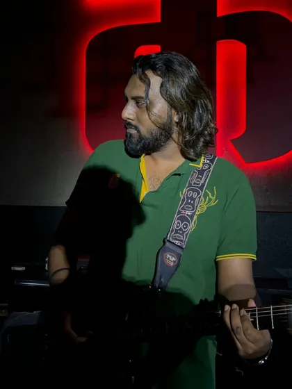 Meet Budhaditya, the master of strings. His electrifying solos and soulful melodies are a key part of our sound.
