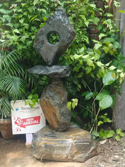 Titled "The Balance of Life," this large abstract garden sculpture is made from natural rock. It's a statement piece for landscaping projects at resorts, hotels, or large private gardens.