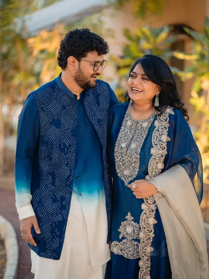 The couple's coordinated blue outfits for the Mameru ceremony, a beautiful blend of traditional silhouettes and modern design.