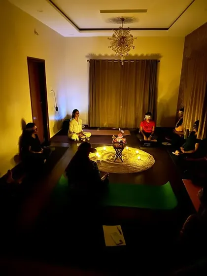 A candlelight meditation session during one of my intimate Anubhuti yoga retreats. We create a calm and sacred atmosphere to help participants turn their awareness inward and find stillness.