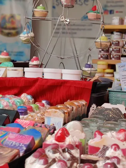 Another view of my vibrant stall, featuring a ferris wheel display for my cupcake soaps.