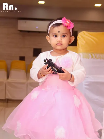 A portrait of the birthday girl during her party. I make sure to get a few lovely posed shots amidst the candid coverage of the event.