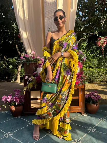 Another shot of my yellow Shivan & Narresh saree. The bold print and playful ruffles make it a standout piece for any festive occasion.