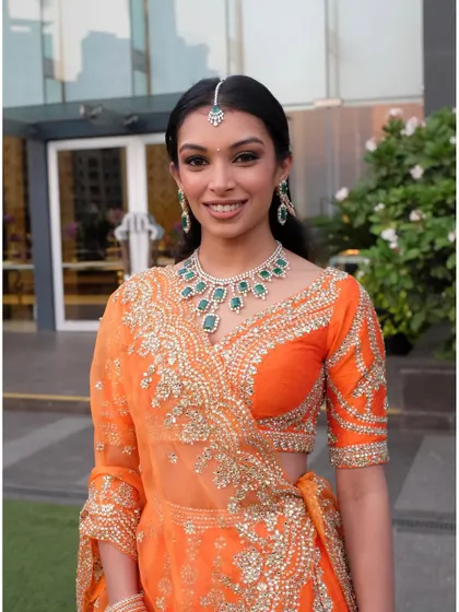 A beautiful, classic portrait. Her makeup is elegant and timeless, a perfect look for a pre-wedding reception.