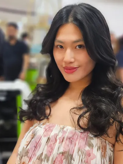 Another client enjoying the benefits of a Kevin Murphy treatment, resulting in gorgeous, soft curls.