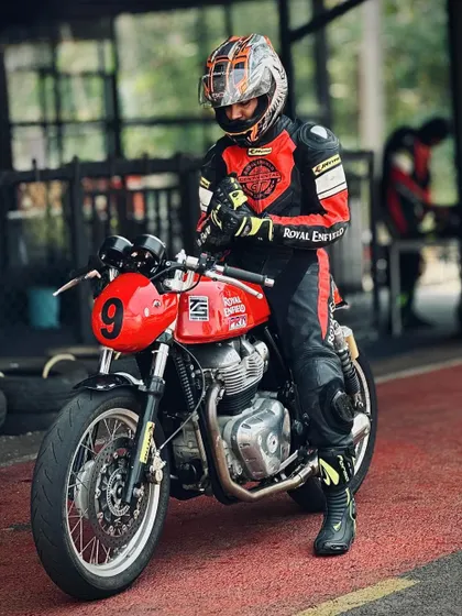 A rider getting ready on his GT 650 in the pit lane. The moments before heading out on track are filled with focus and anticipation.