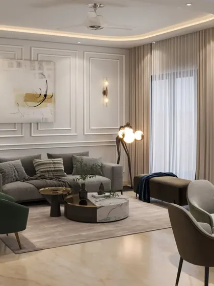 An elegant living room with a neutral color palette, featuring a grey sofa, green accent chairs, and a marble-top coffee table. The classic wall molding and contemporary art create a sophisticated and balanced interior.